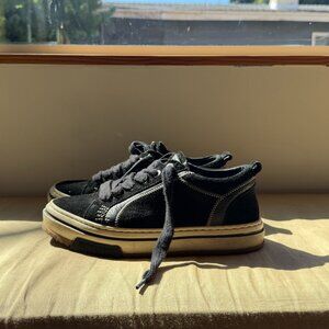 all black htn low black represent sneakers